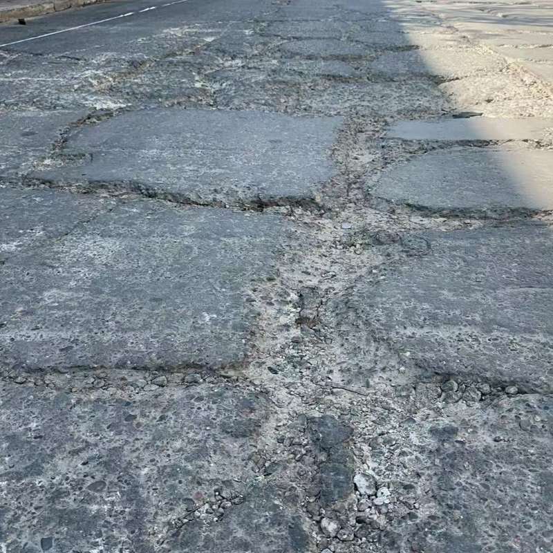 鲁甸路面起砂露石子修补料